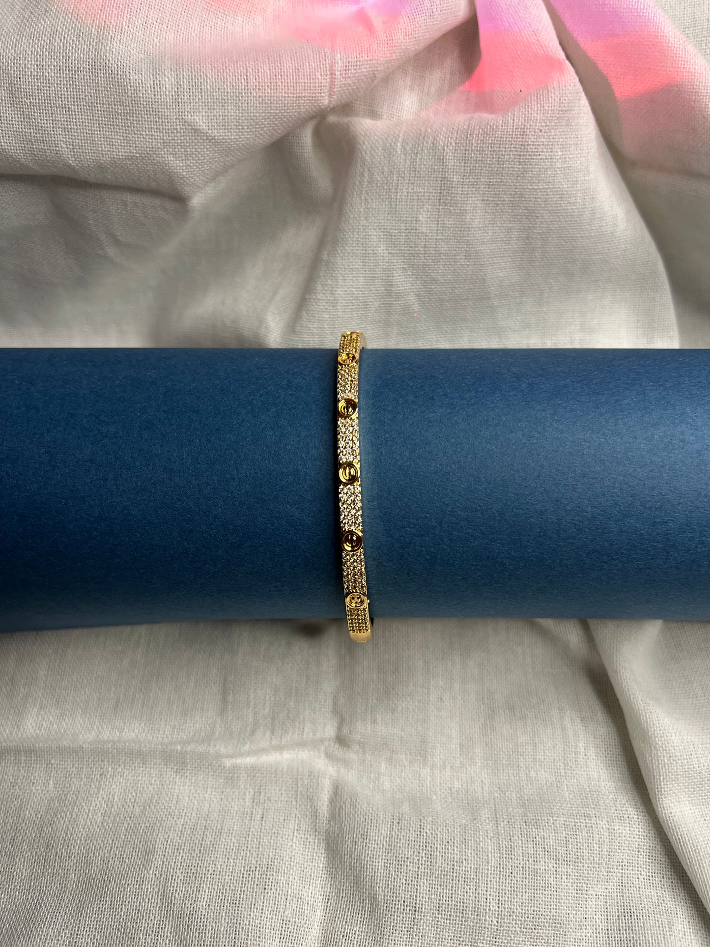 π Elegant Gold Textured Stone-Studded Bracelet