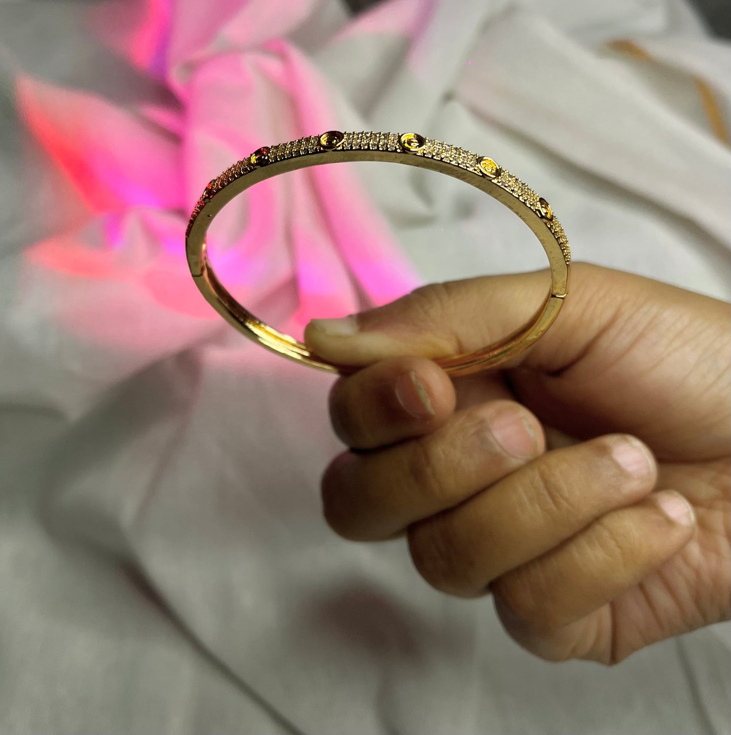 π Elegant Gold Textured Stone-Studded Bracelet