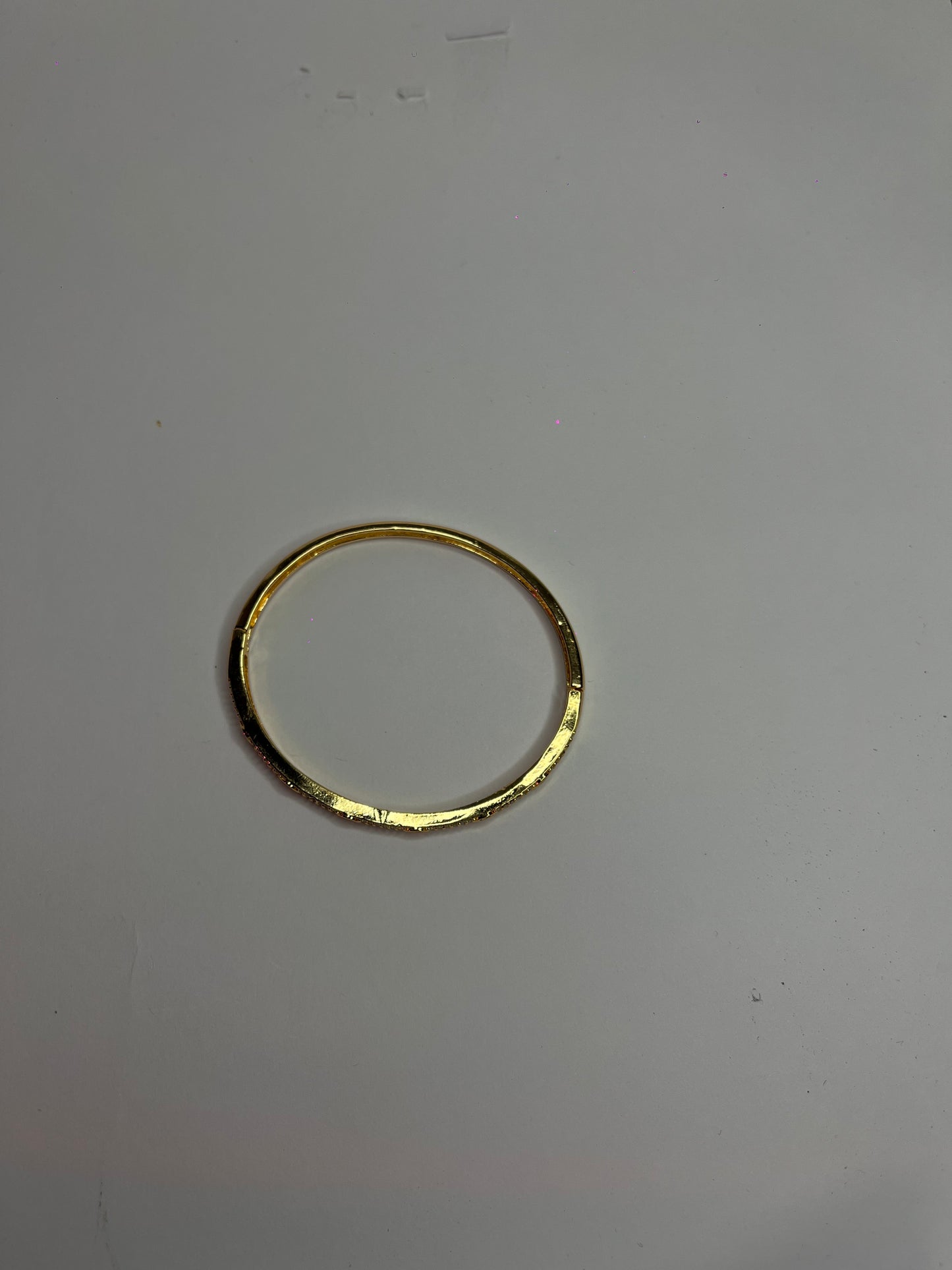 π Elegant Gold Textured Stone-Studded Bracelet