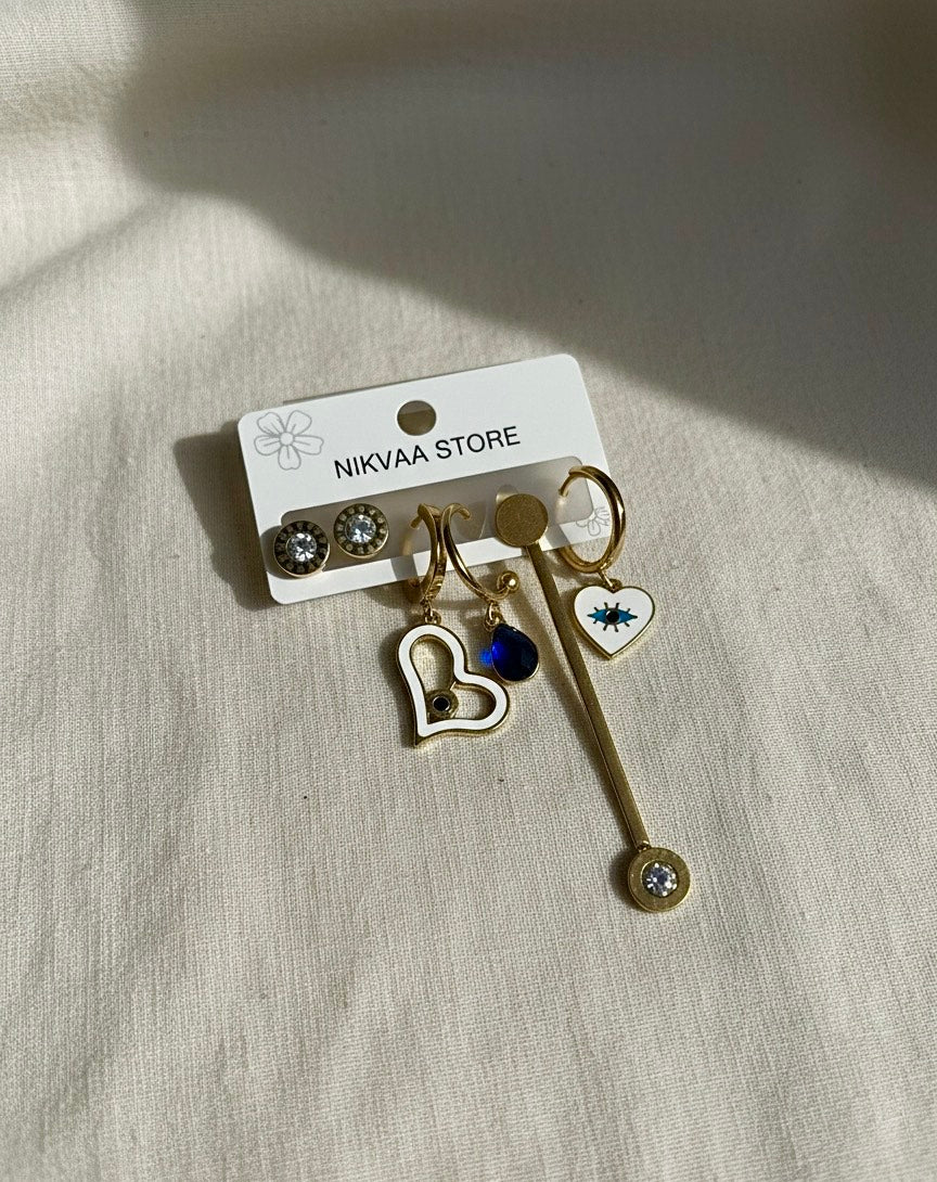 Chic Gold Heart & Eye Earring Set – Modern Flair